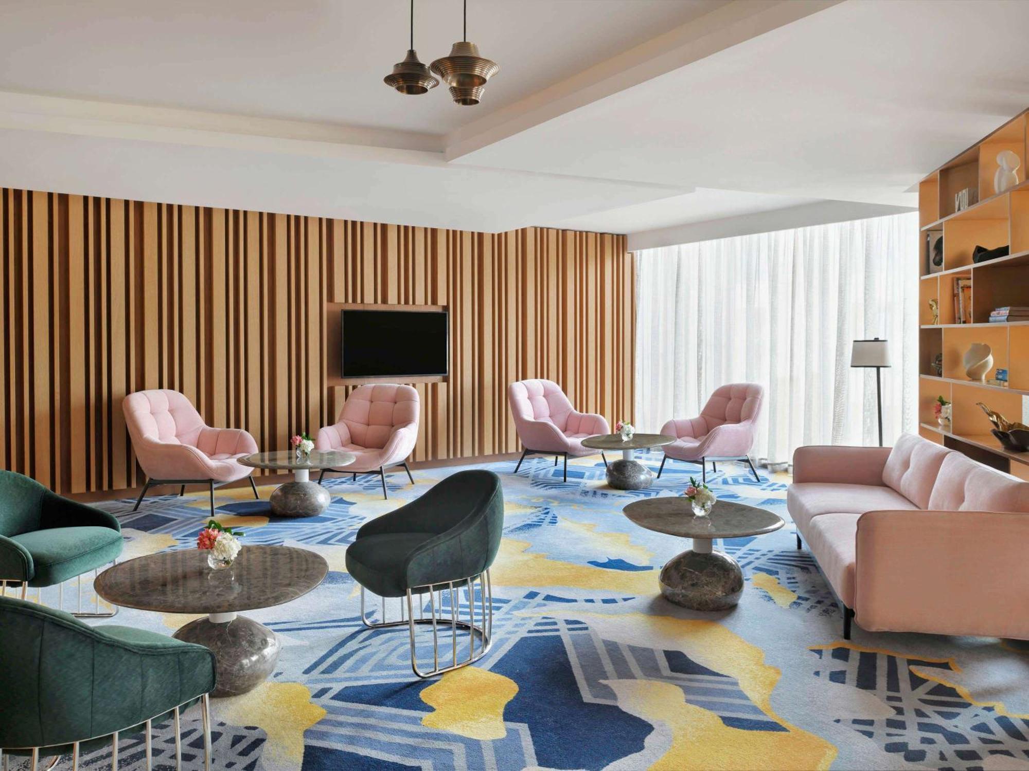 Moevenpick Hotel & Apartments Ghala Mascate Exterior foto The Living Room