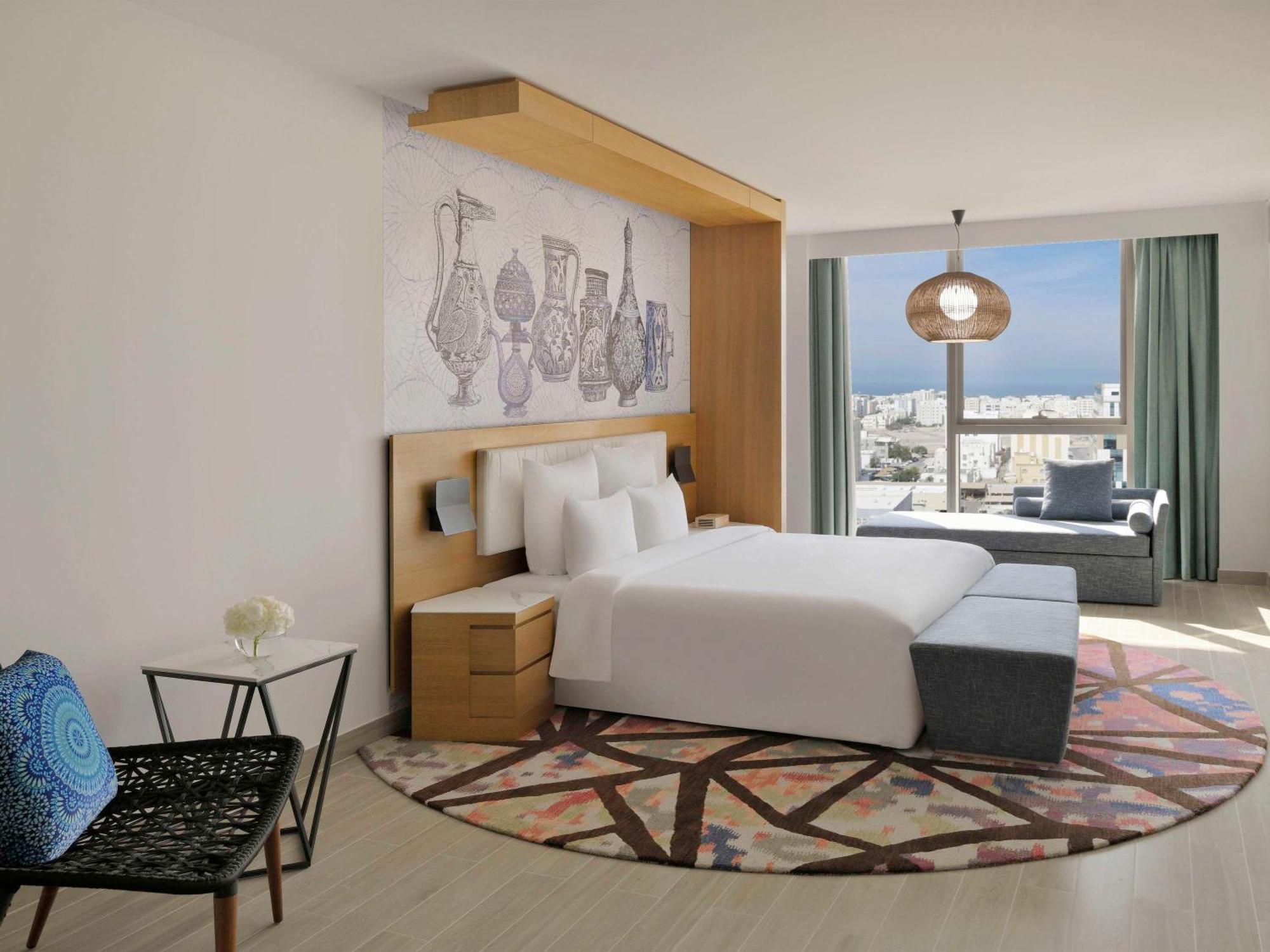 Moevenpick Hotel & Apartments Ghala Mascate Exterior foto Deluxe room